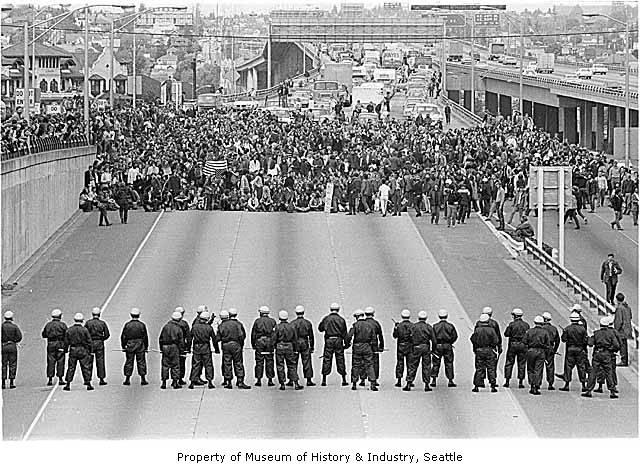 Protestors_and_police_on_I5_Seattle_May_5_1970-1.jpg